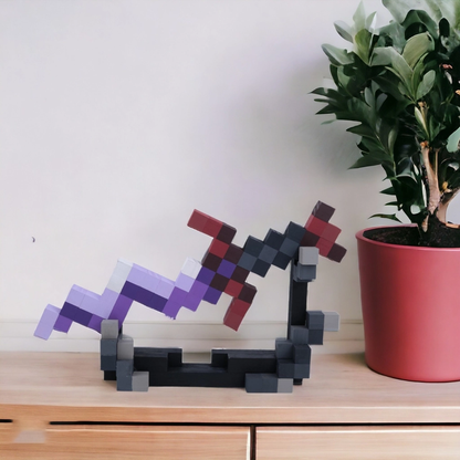 Handcrafted Minecraft Eternal Knife showcased indoors on a wooden shelf next to a potted plant.